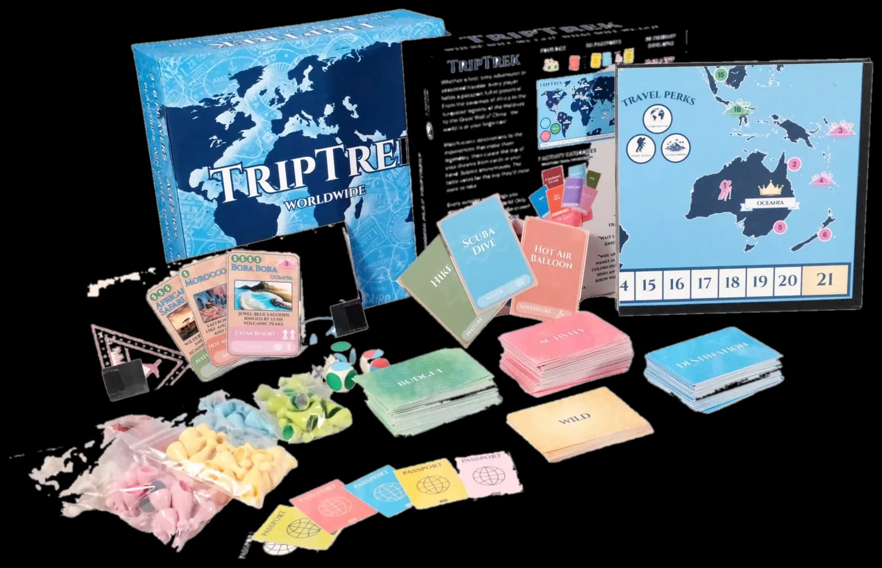 TripTrek prototype game box, board, cards, dice, passports, and playing pieces laid out together.